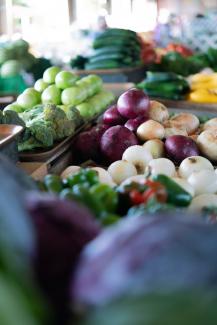 Fresh, farm food on display at a grocery store.